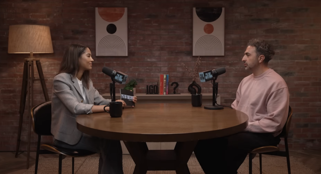 Sinead Bovell in the living room set at asl studios on the brick wall set with brown table and sm7b mics